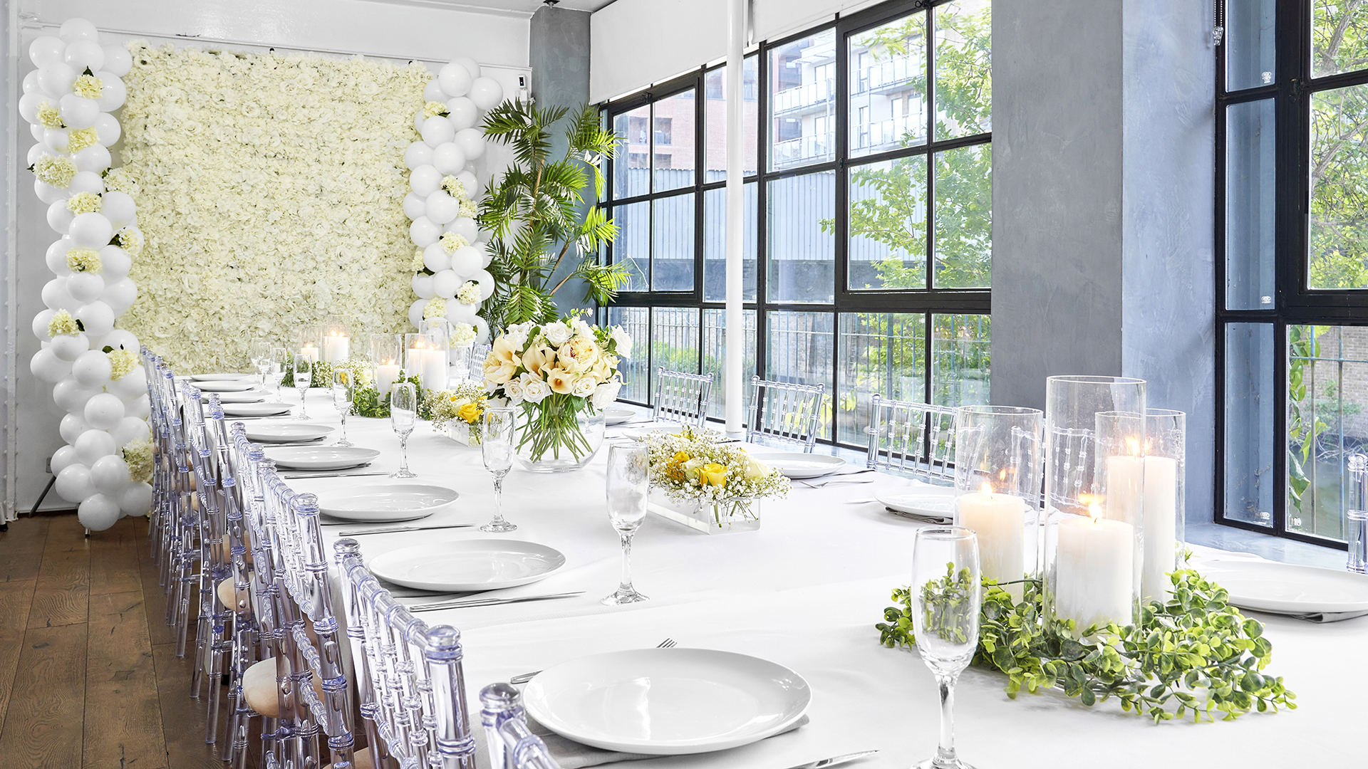 Elegant event space with floral centerpieces, ideal for weddings and corporate gatherings.