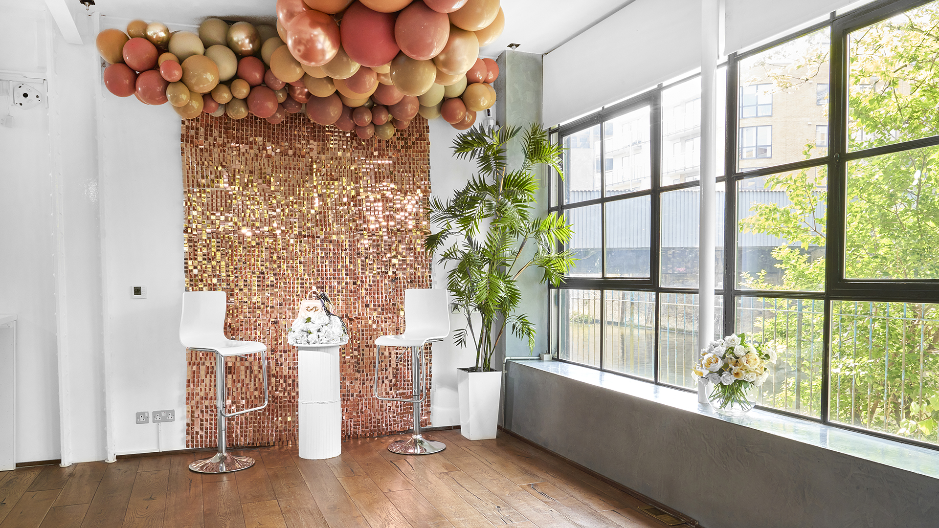 Stylish S1 Apartment event space with balloon installation for gatherings and celebrations.