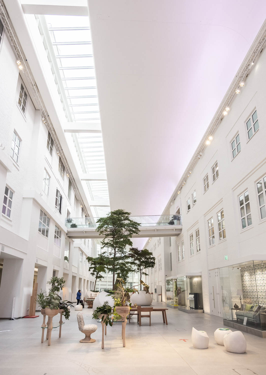 Modern event venue in Chelsea Harbour with natural light and greenery for meetings.