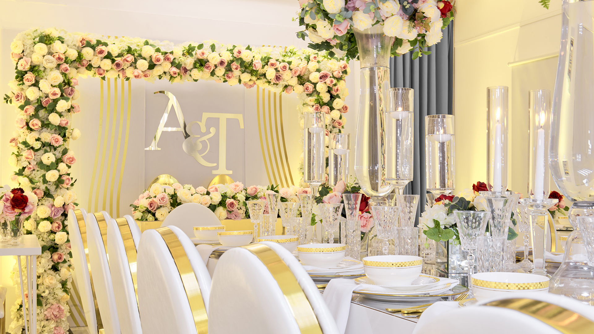 Elegant wedding venue with floral decor and gold accents at S3 Royal Arsenal Events.