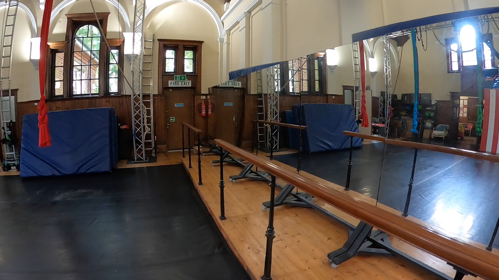 Versatile event space with polished wooden floor at West Midlands Circus Centre for workshops.