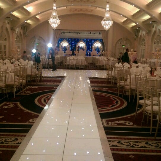 Elegant banquet hall in The Emperor Suite, featuring a polished runway for weddings and events.