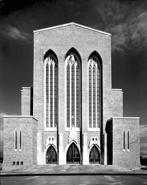 Guildford Cathedral chapel with grand arched windows, perfect for formal events.