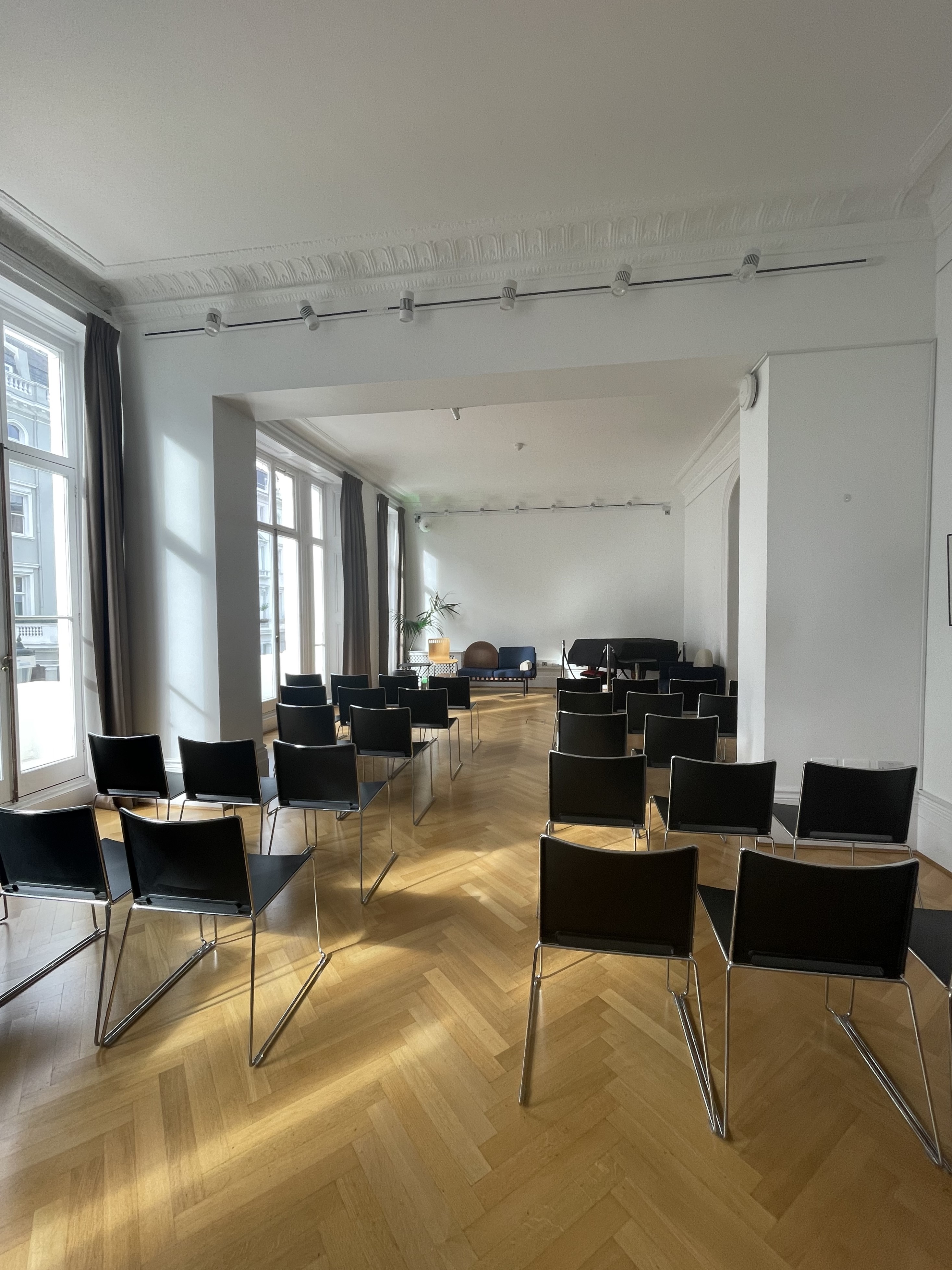 Minimalist event space at Institut français, ideal for workshops and presentations.