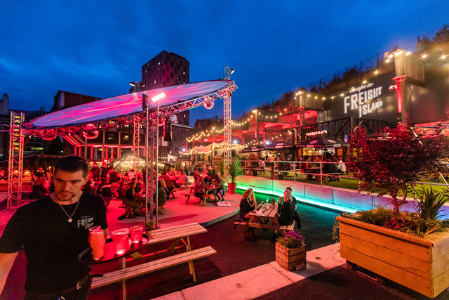 Vibrant outdoor Food Hall at Escape to Freight Island, perfect for summer events and parties.