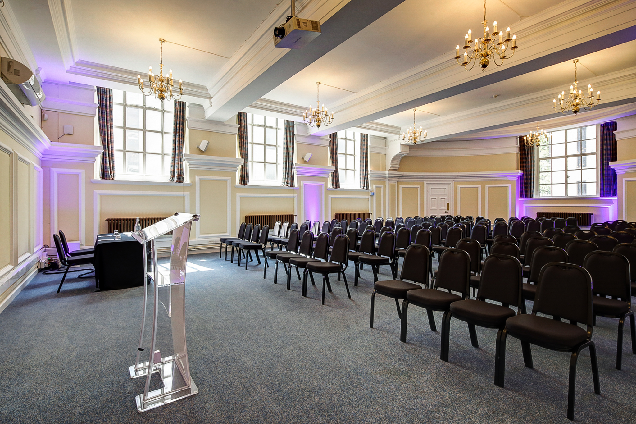Robert Perks speaking at Central Hall Westminster, a premier venue for conferences and presentations.