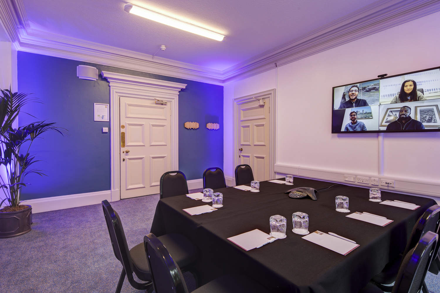 Syndicate Rooms at Central Hall Westminster, ideal for hybrid meetings with blue lighting.