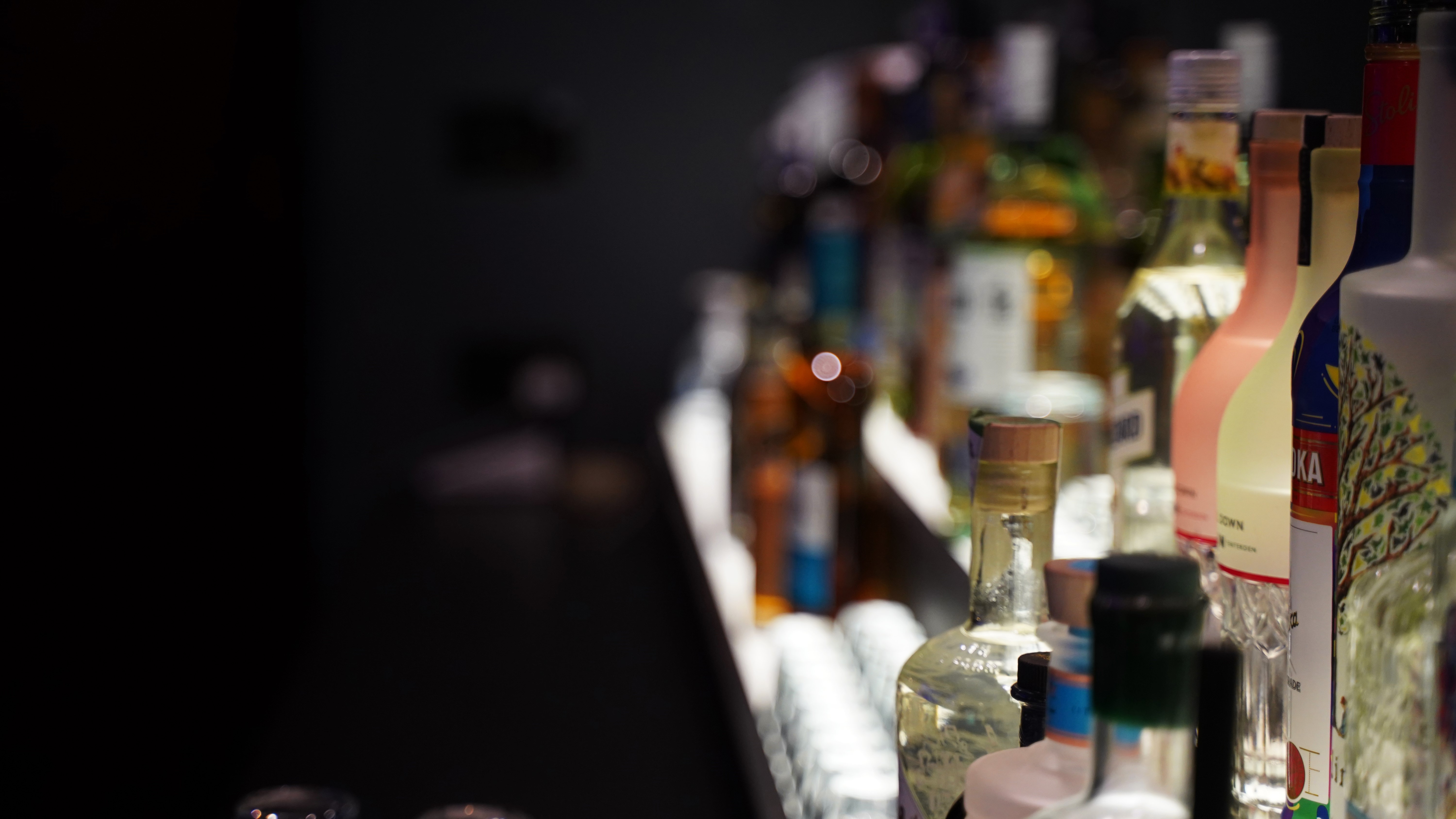 Well-stocked bar at The Axis, perfect for networking events and social gatherings.