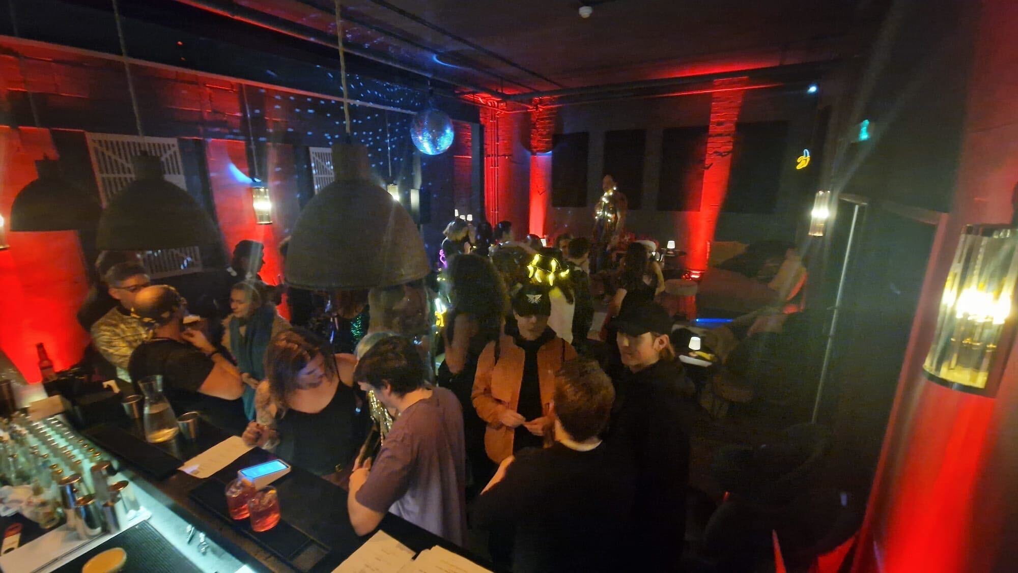 Vibrant event space at The Axis with lively atmosphere for networking and social gatherings.