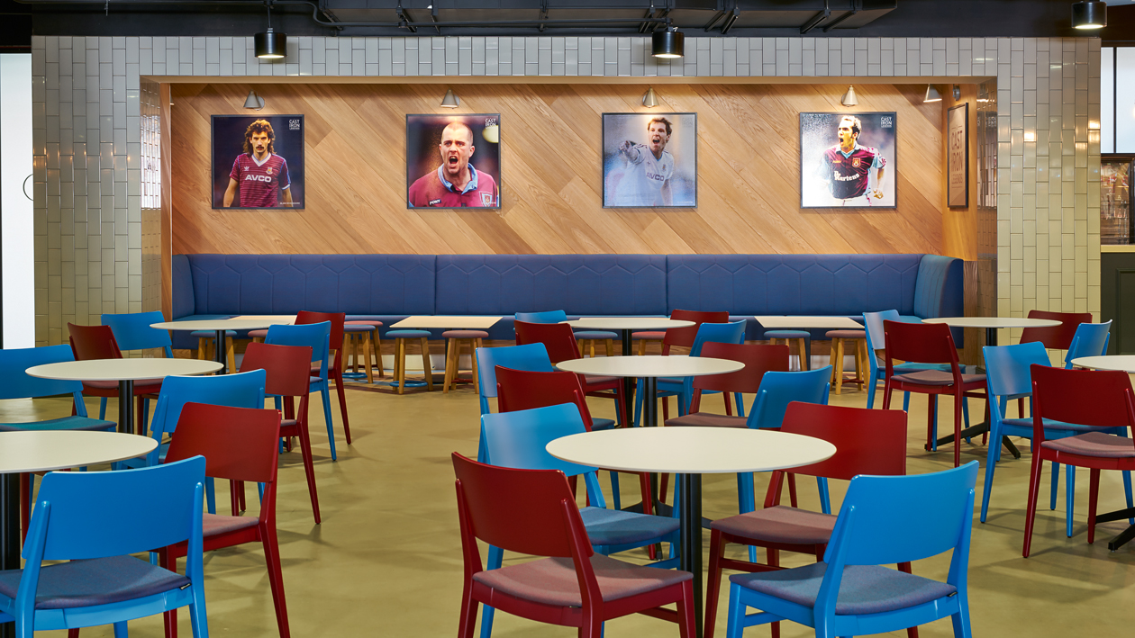 Modern meeting space at The Boleyn, colorful chairs for networking events in London.