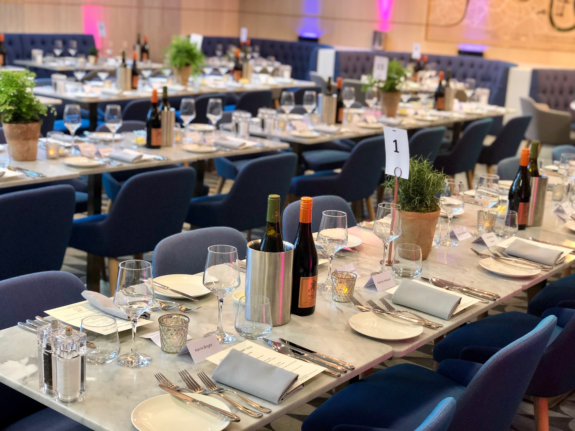 Elegant dining setup at The Royal East, London Stadium for a professional event.