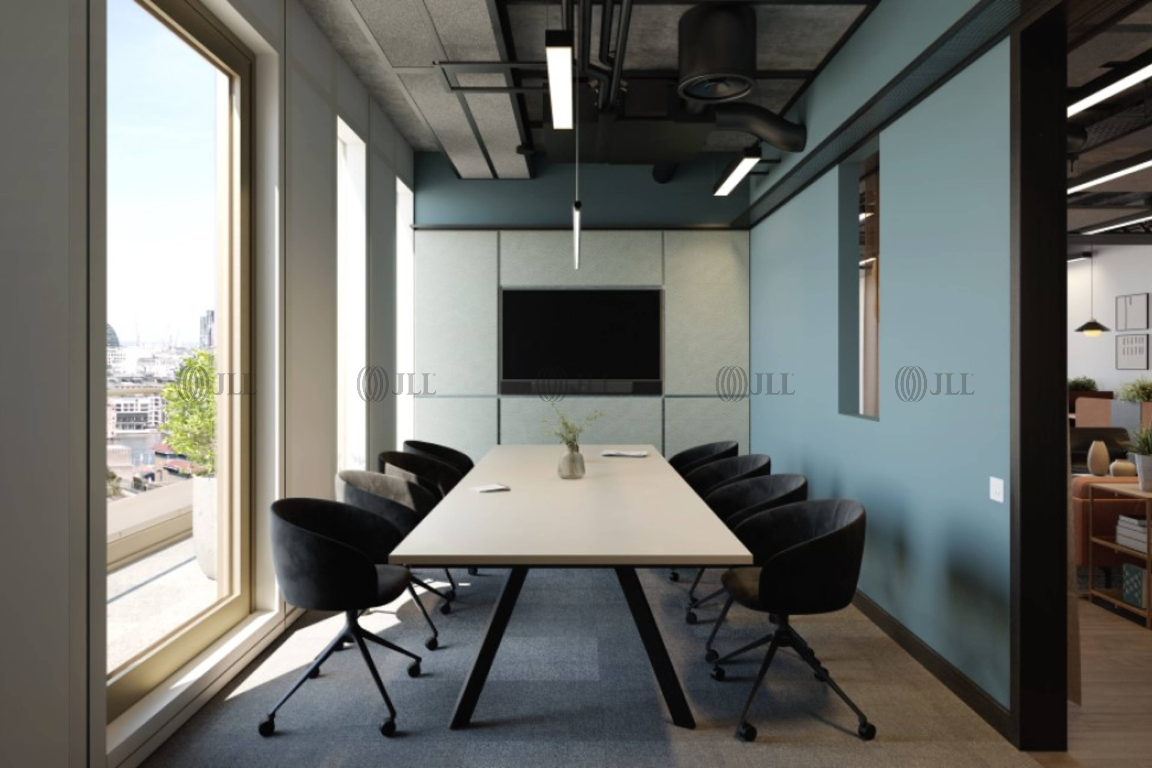 Modern conference room with large table, ideal for hybrid meetings at Eighth Floor Lounge.
