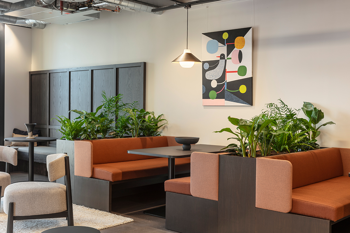 Modern meeting space with vibrant decor for creative gatherings at Eighth Floor Lounge.