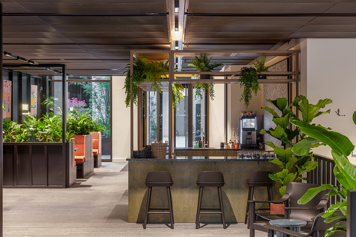 Modern event suite with greenery, ideal for networking and meetings at Myo Bankside.
