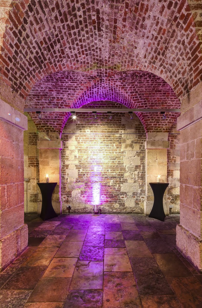 Stylish event space in St Martin-in-the-Fields with exposed brick and elegant lighting.