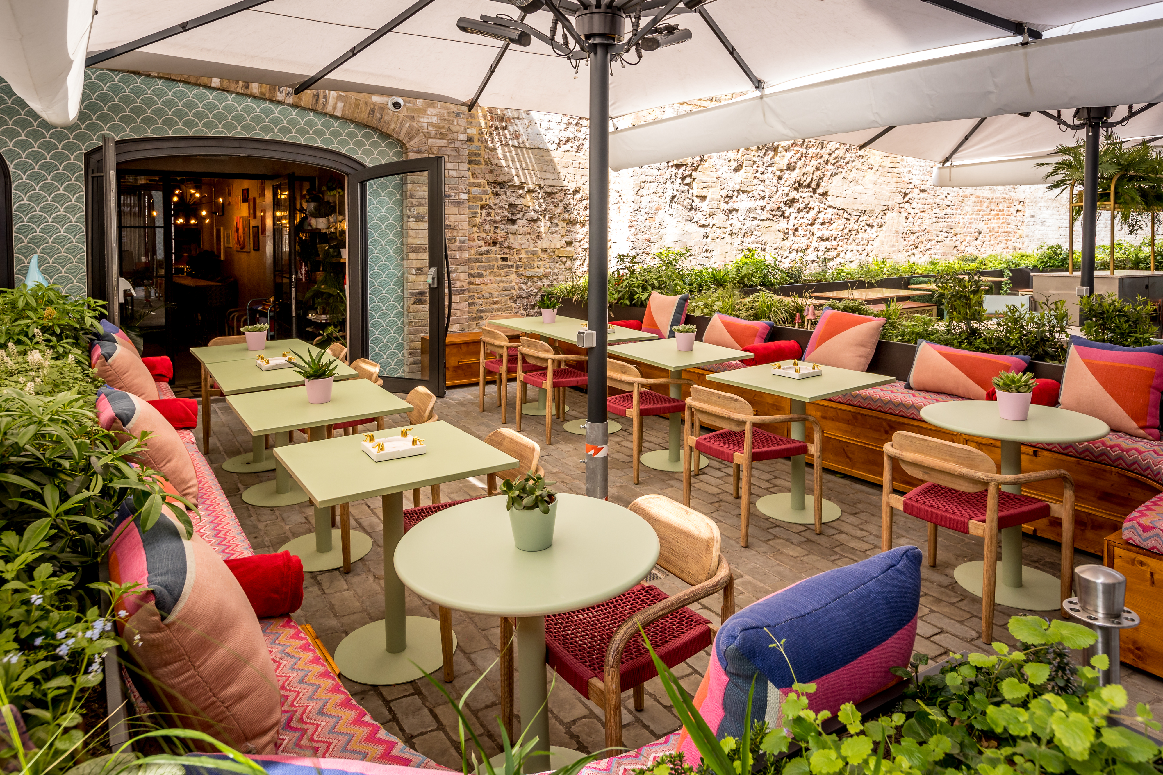 Vibrant outdoor event space with colorful seating for casual gatherings and networking.