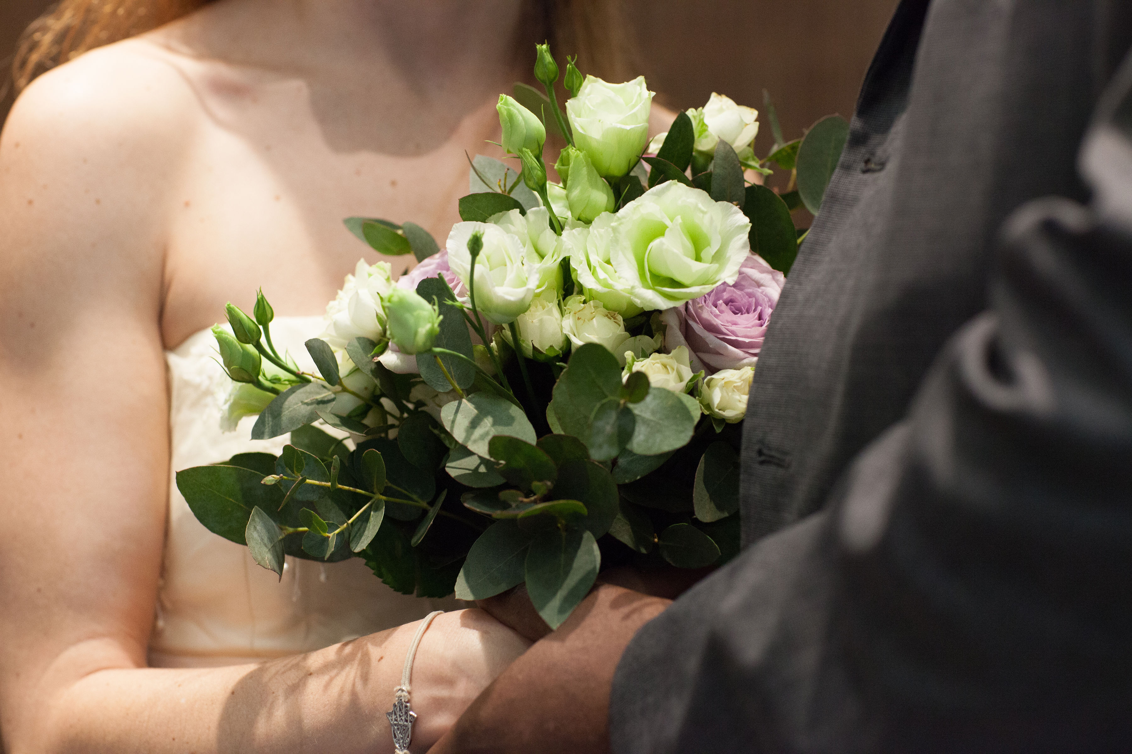 Bride holding a stunning bouquet at Weddings in Events @ No 6, showcasing elegant floral arrangements.