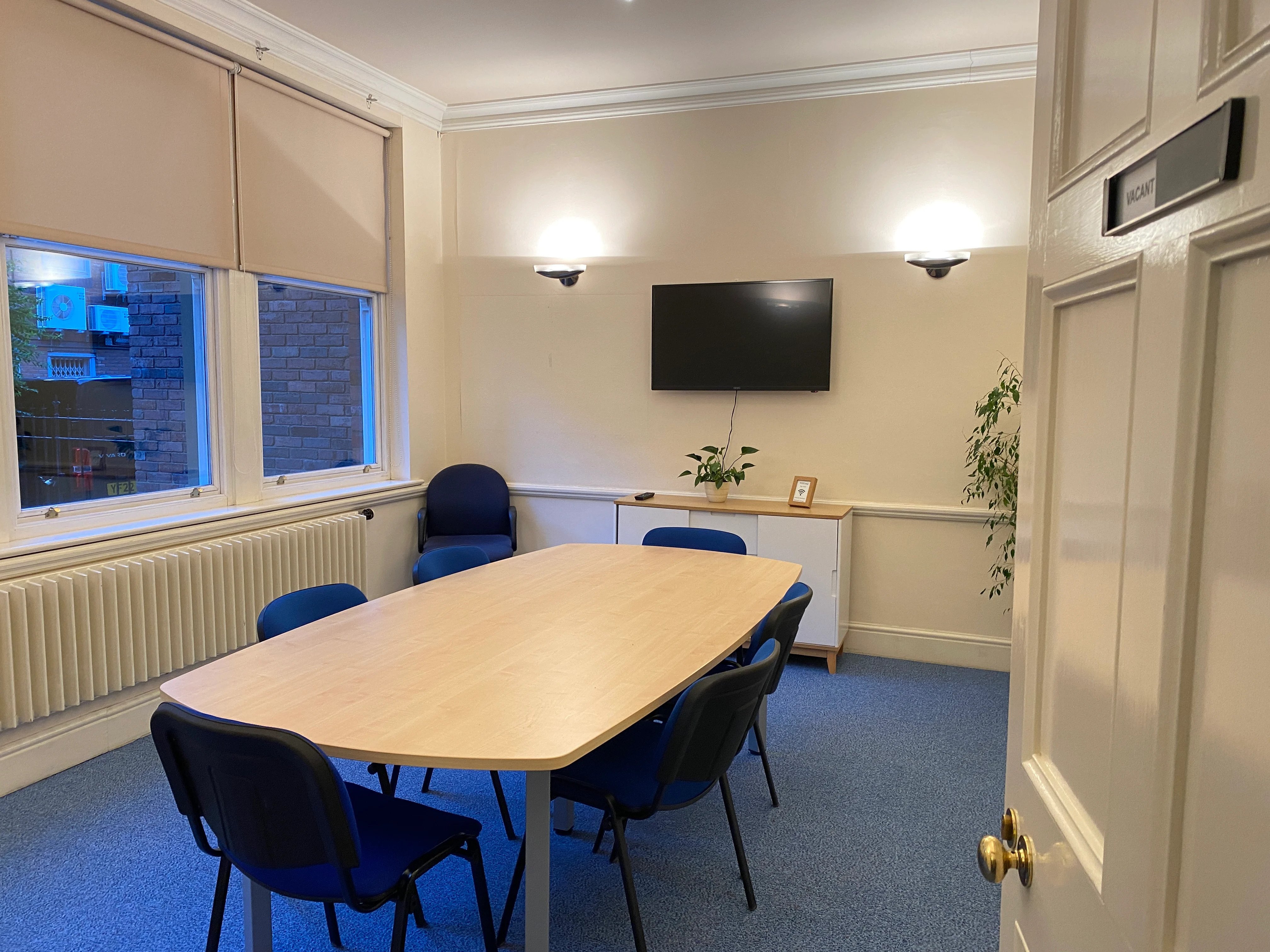Function room in The Chambers Leeds, round table setup for meetings and workshops.