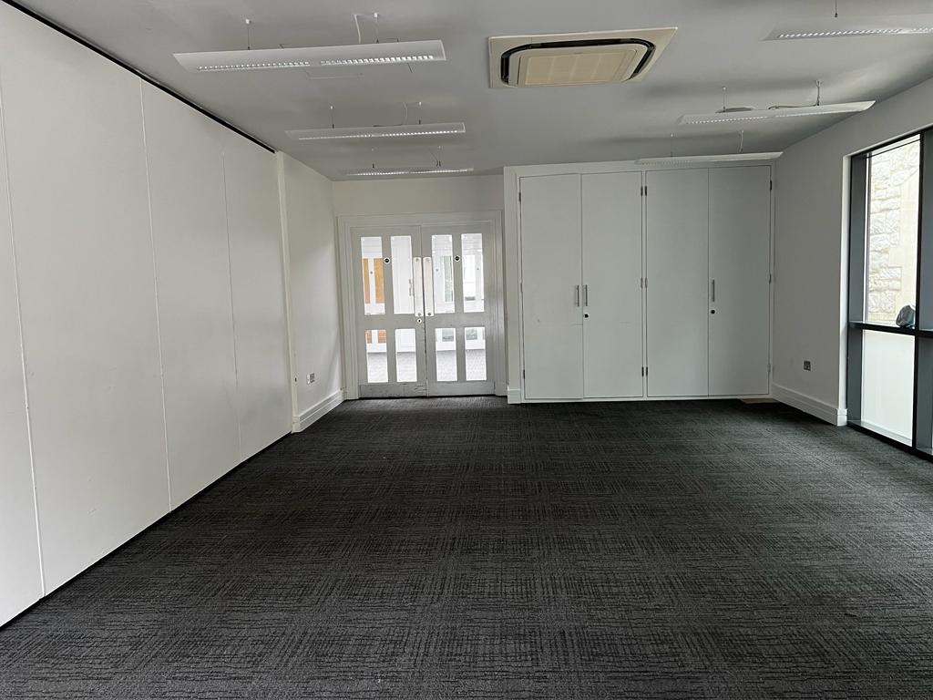 Versatile Ruby Suite in The Rock Tower, ideal for workshops and conferences.