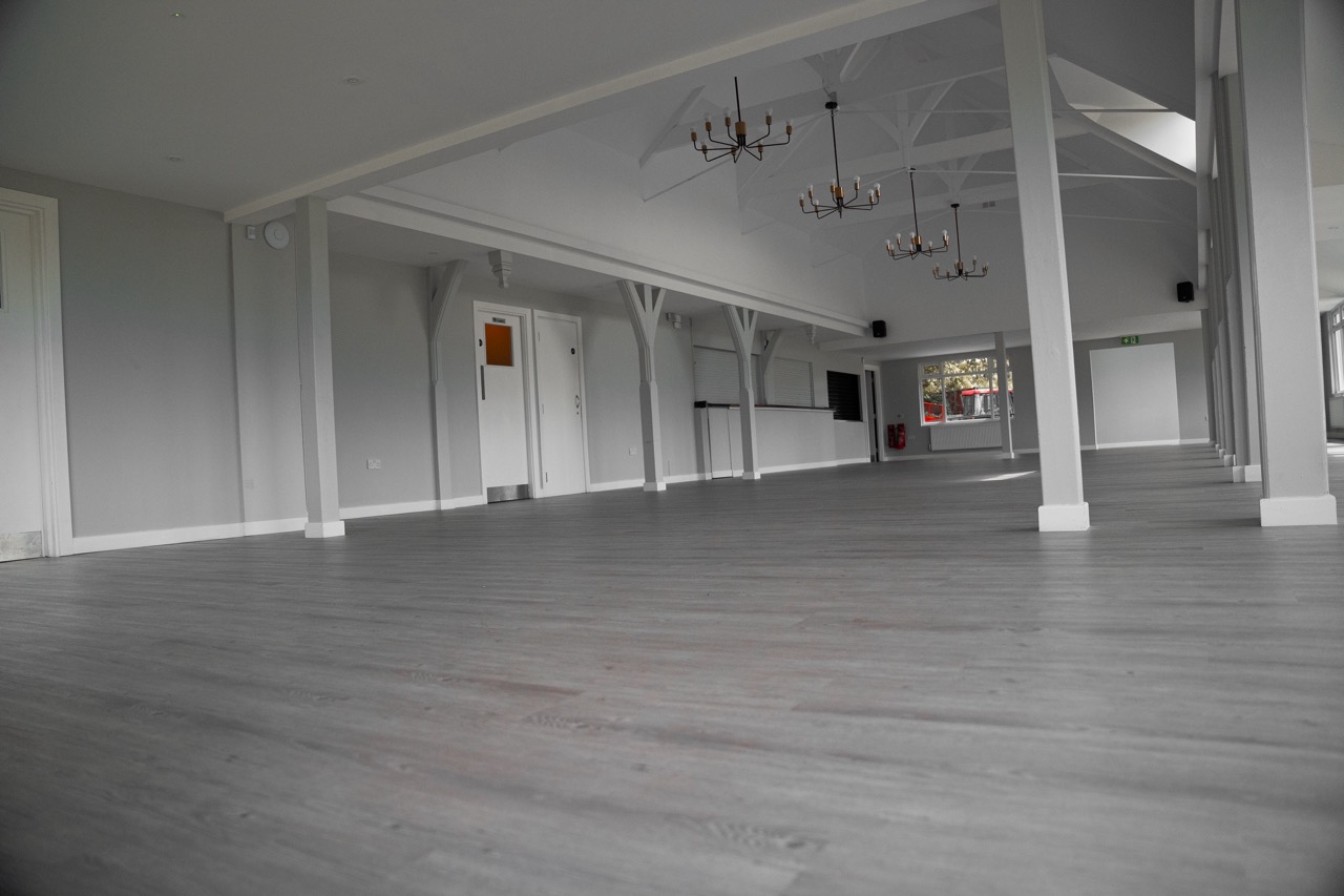 Spacious modern event venue with high ceilings at The Griffin Sports Ground.