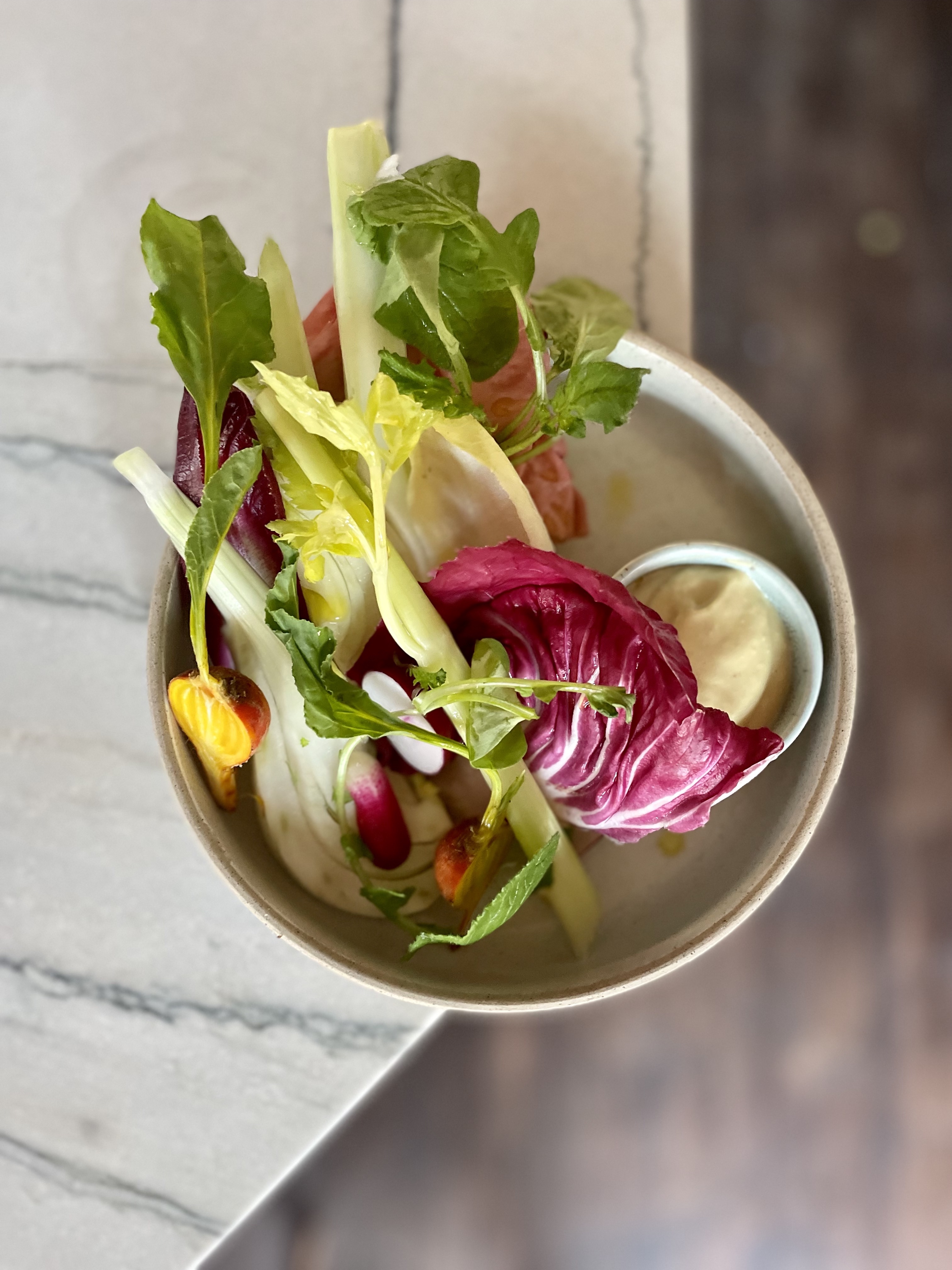 Vibrant salad with fresh ingredients for event catering and dining experience.