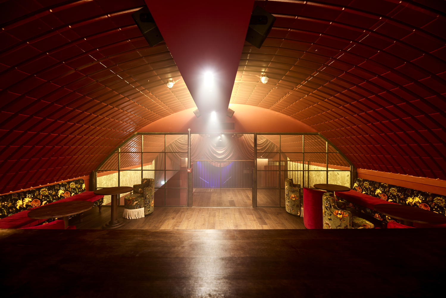 Stylish Omeara event space with arched ceiling for corporate meetings and social gatherings.
