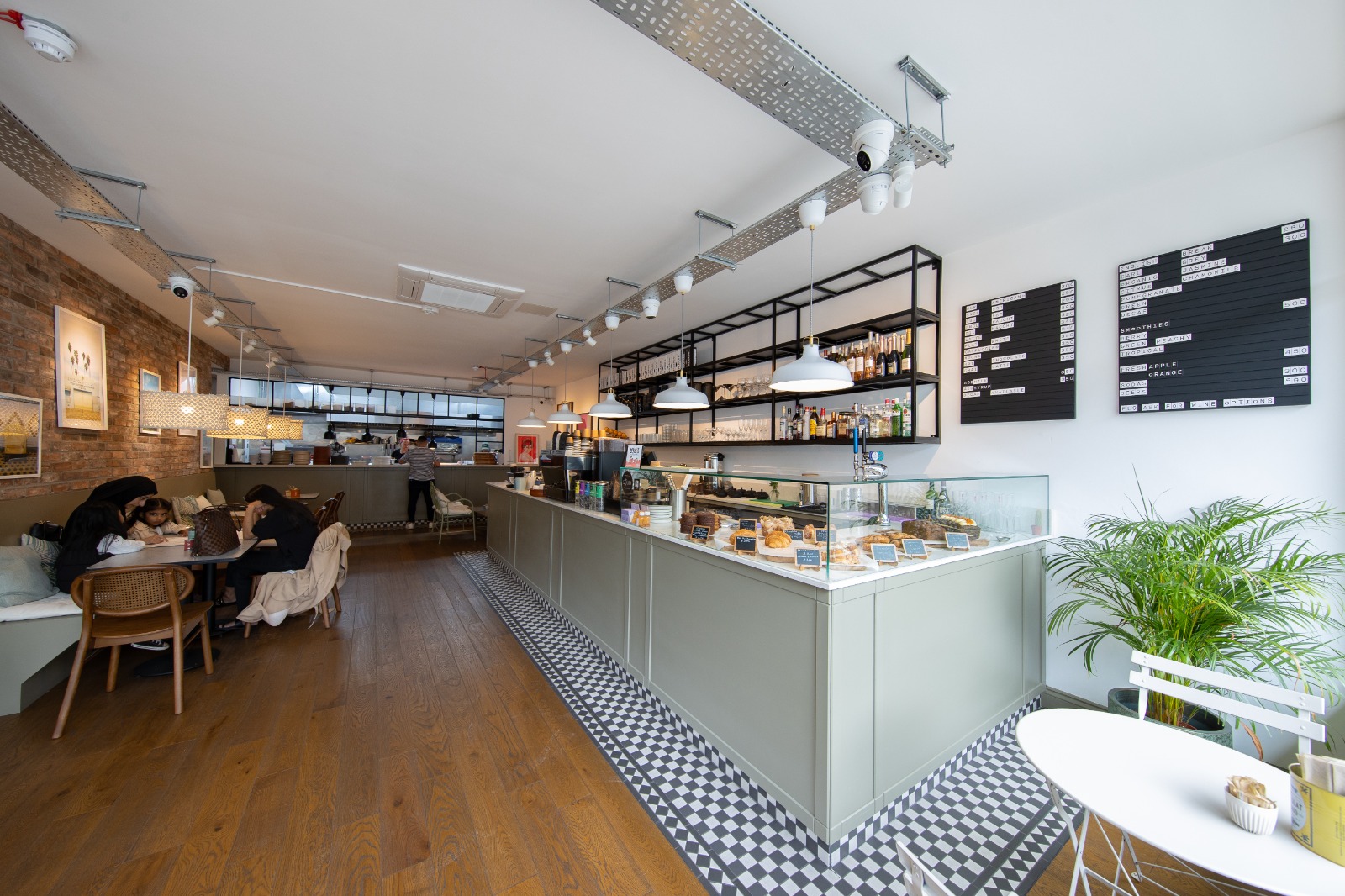 Modern café with natural light, ideal for networking events and informal meetings.