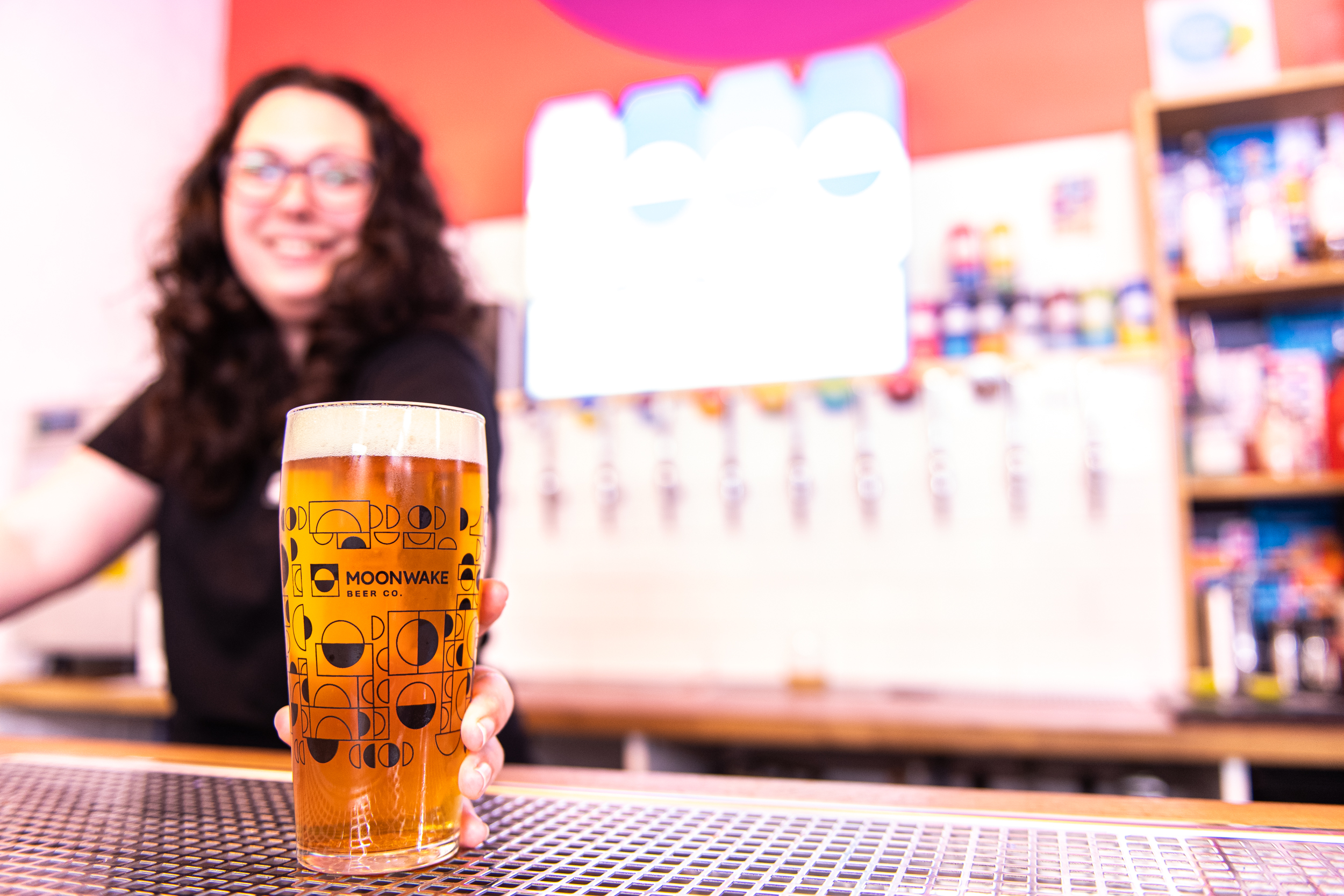 Vibrant bar scene at Moonwake Taproom, ideal for networking events and casual gatherings.