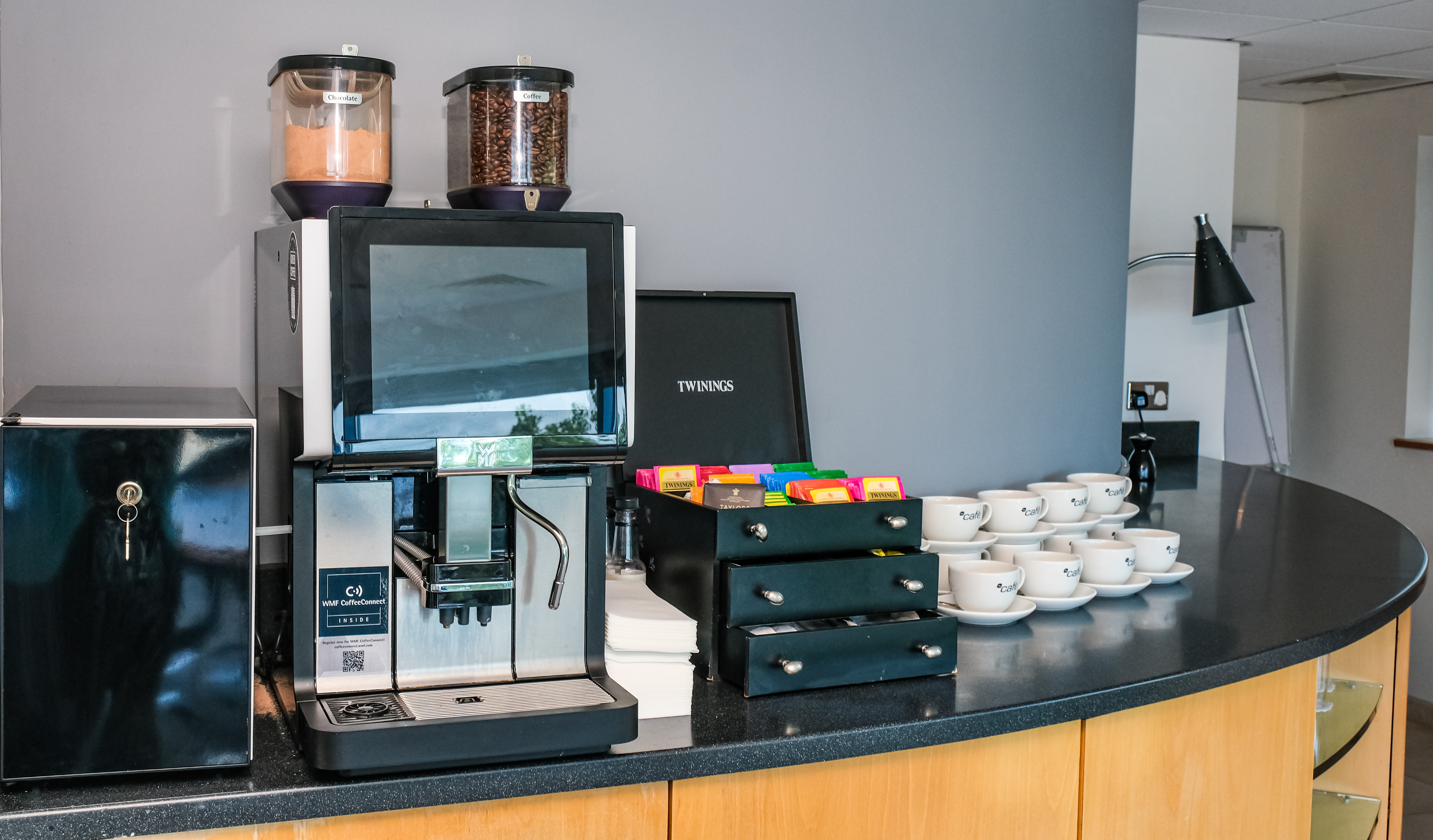 Srivikorn Suite refreshment station with coffee machine for meetings and events.