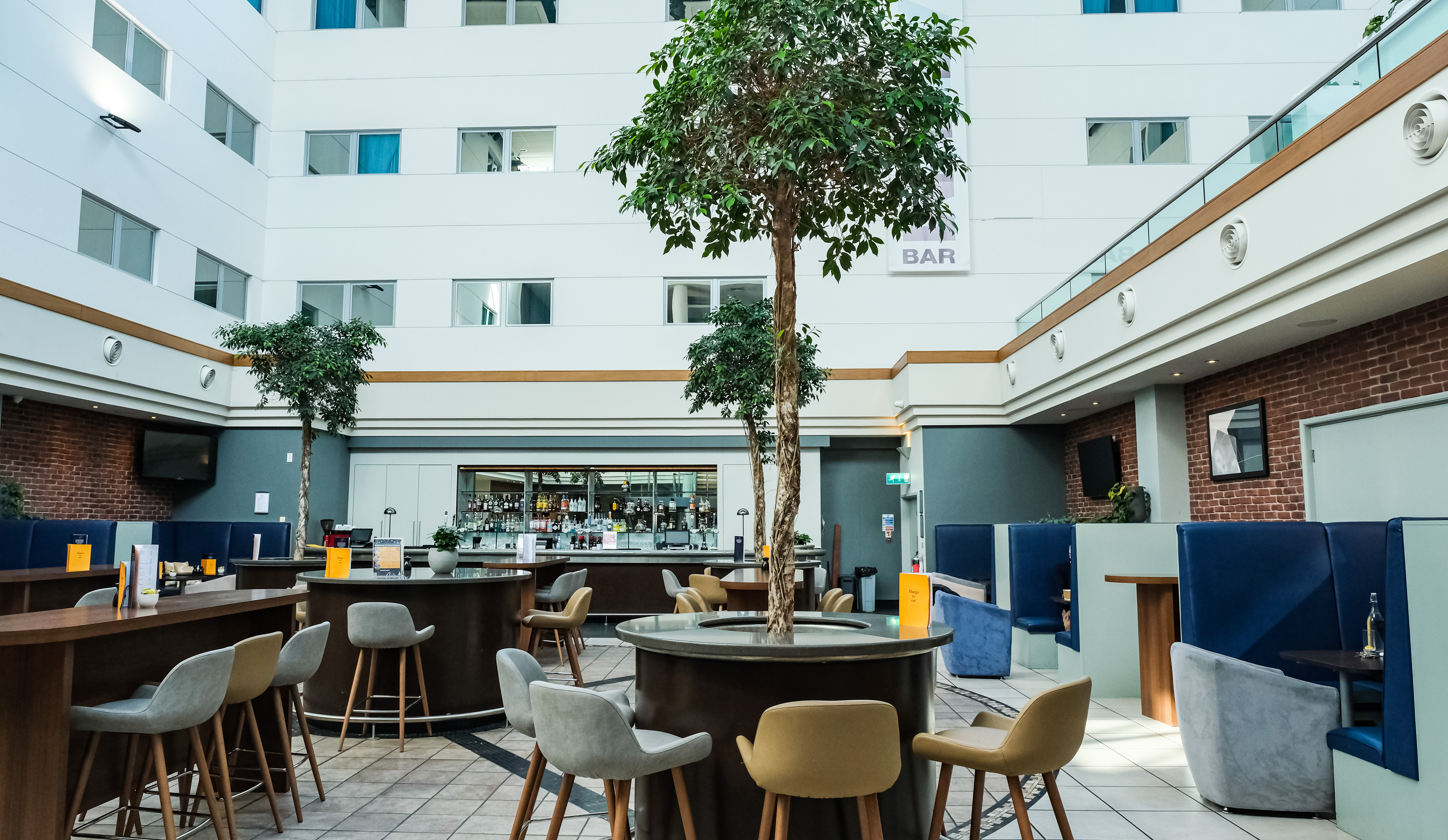 Atrum Bar at Voco Reading: modern venue with greenery for networking events and gatherings.