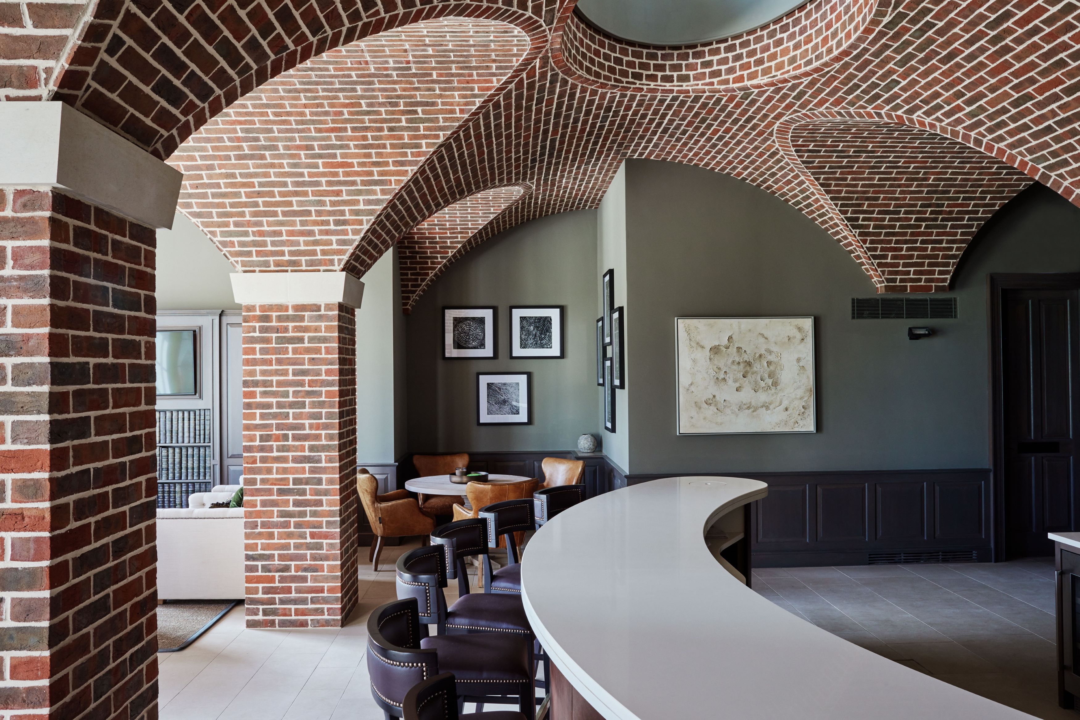 Exton Hall meeting space with elegant arches, ideal for networking events and gatherings.