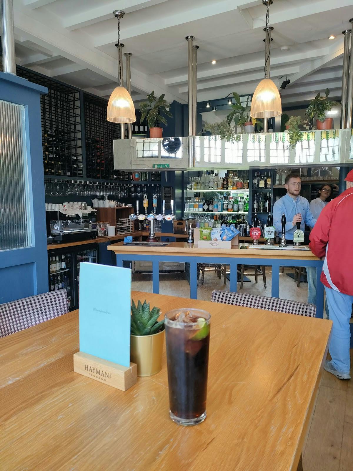 Stylish bar at The Greyhound Kew, perfect for networking events and casual meetings.