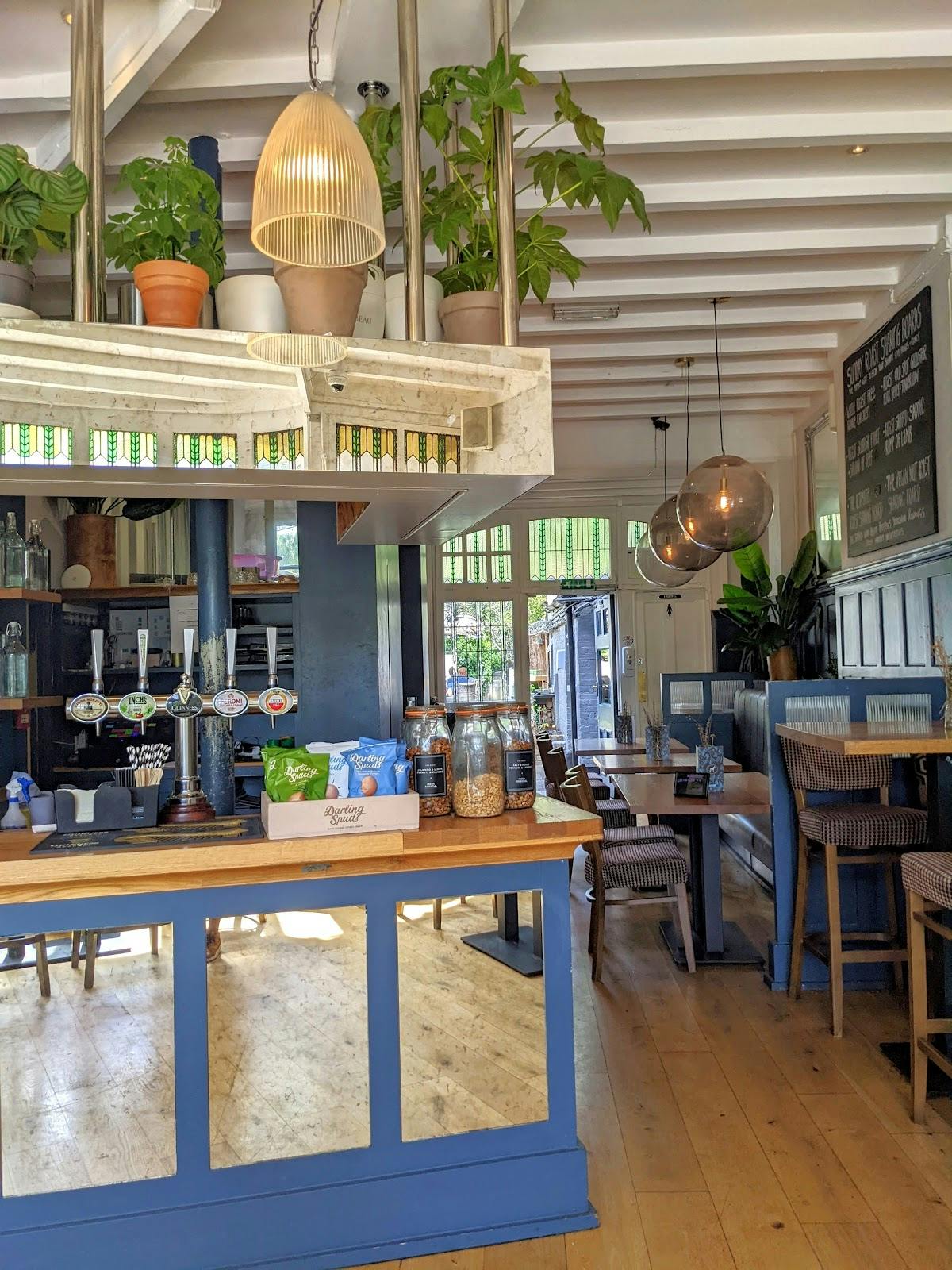 Stylish bar at The Greyhound Kew, ideal for casual meetings and events.