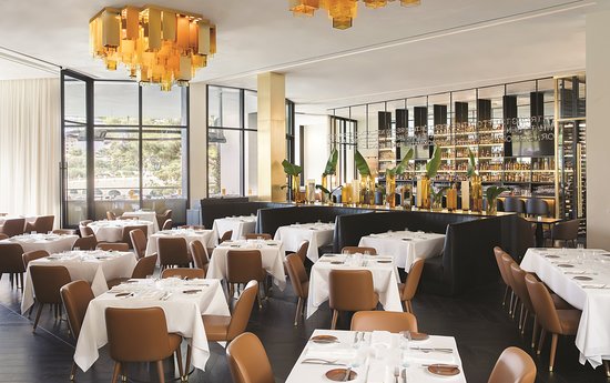 Private dining room in Spago with elegant decor, ideal for upscale events and gatherings.