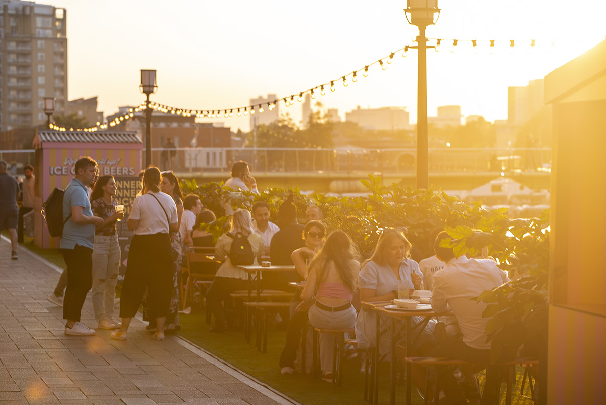 Vibrant Summer Terrace event space at golden hour, ideal for social gatherings and networking.