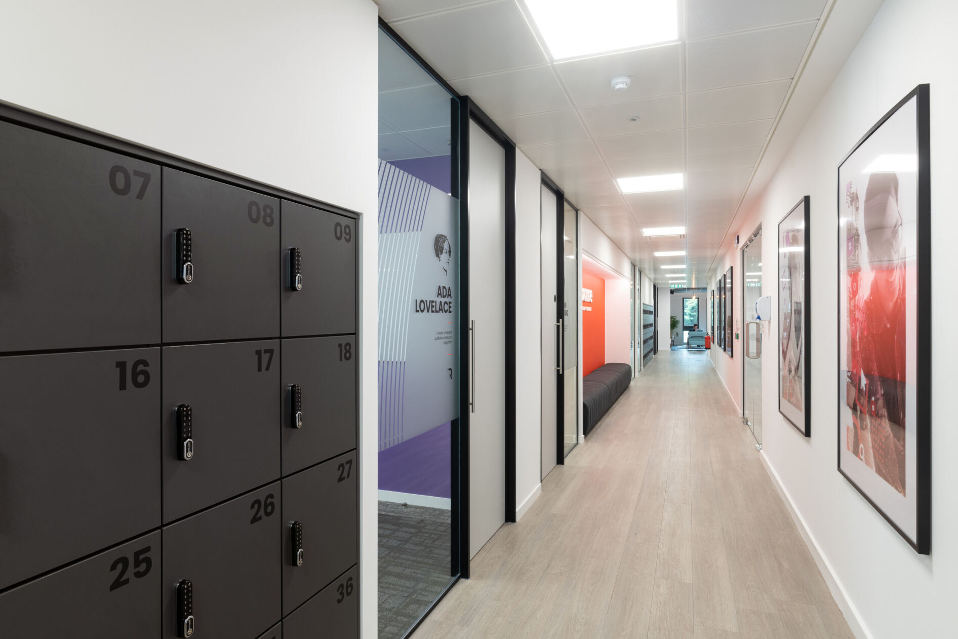 Modern corridor with sleek lockers in Melbury House training facility for professional events.