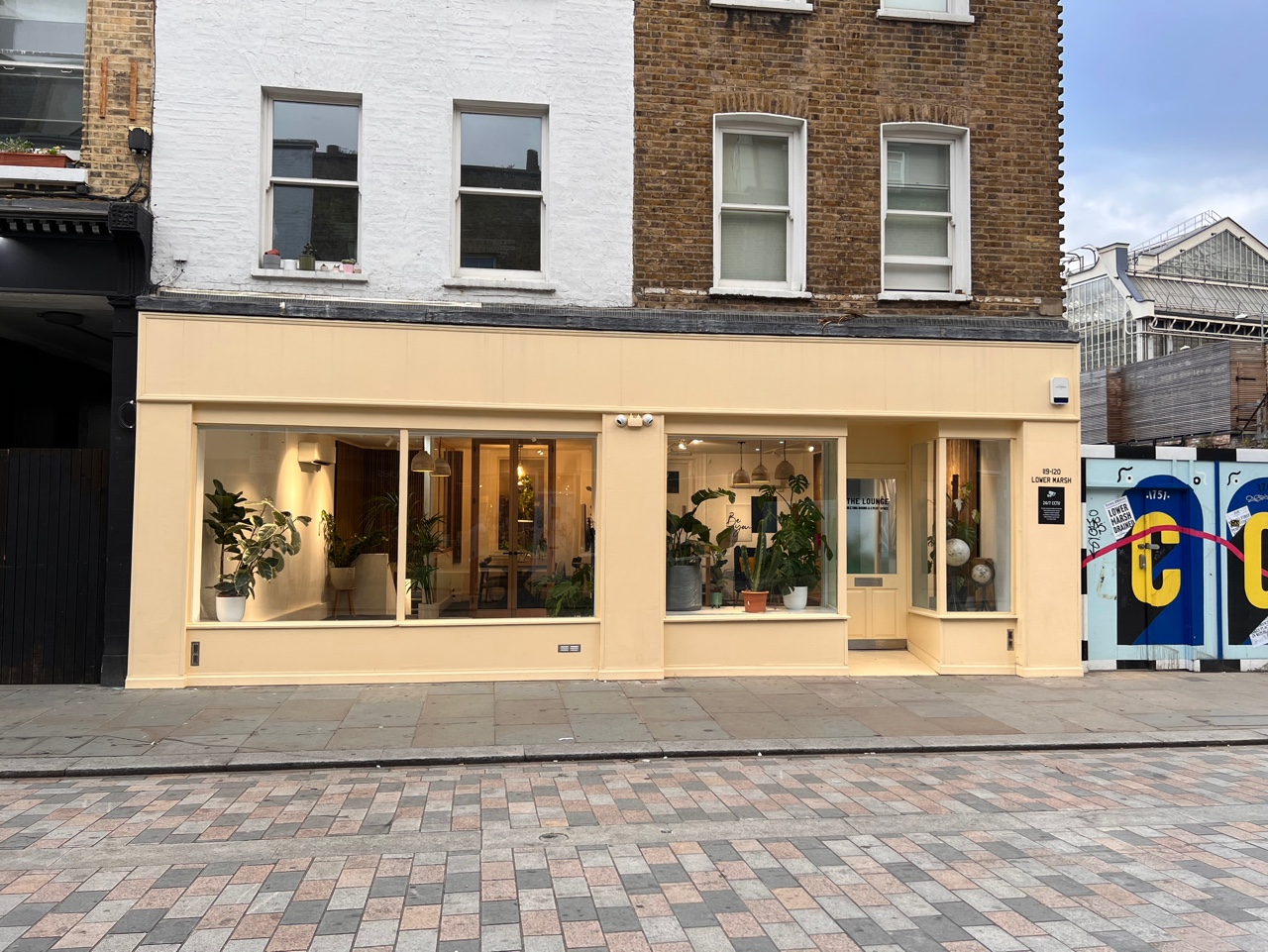 Charming Travel Cafe Lounge venue with large windows for meetings and workshops.