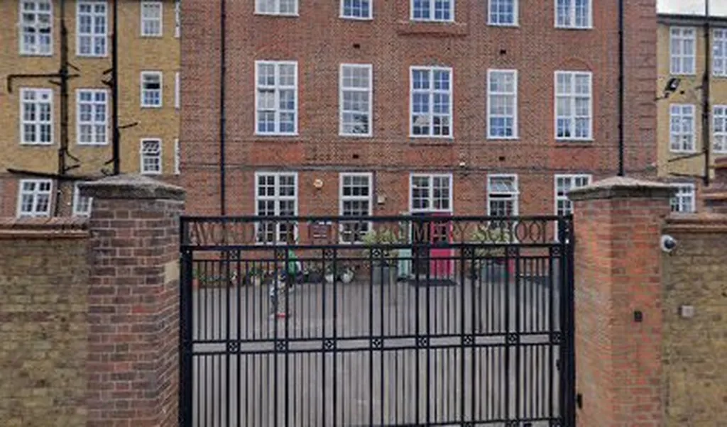 Avondale Park Primary School Main Hall, charming brick building for events and gatherings.