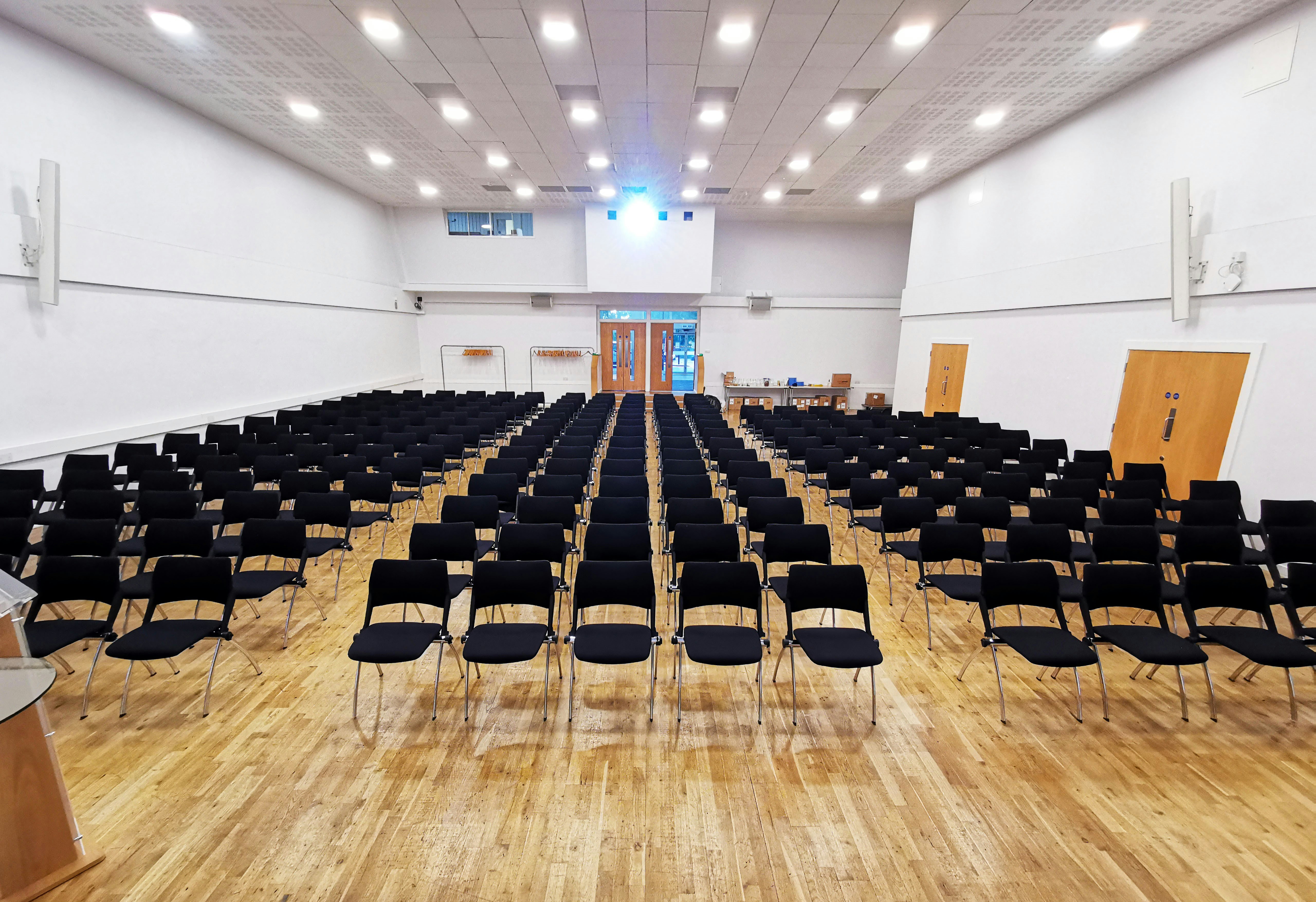 Event Hall at MPW Queen's Gate House with black chairs for a seminar setup.