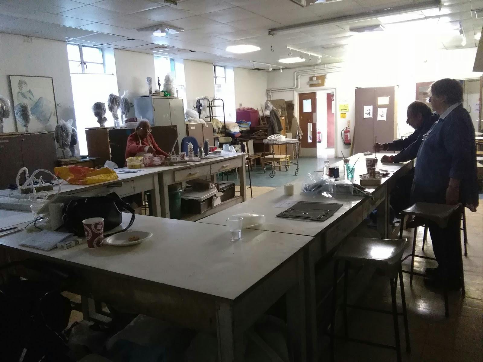 Art studio kitchen with ample workspace for catering events and meal prep.