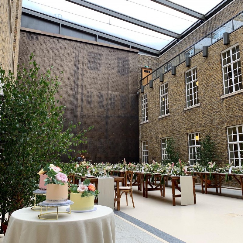 Hackney Town Hall event space with floral centerpieces, ideal for gatherings and celebrations.