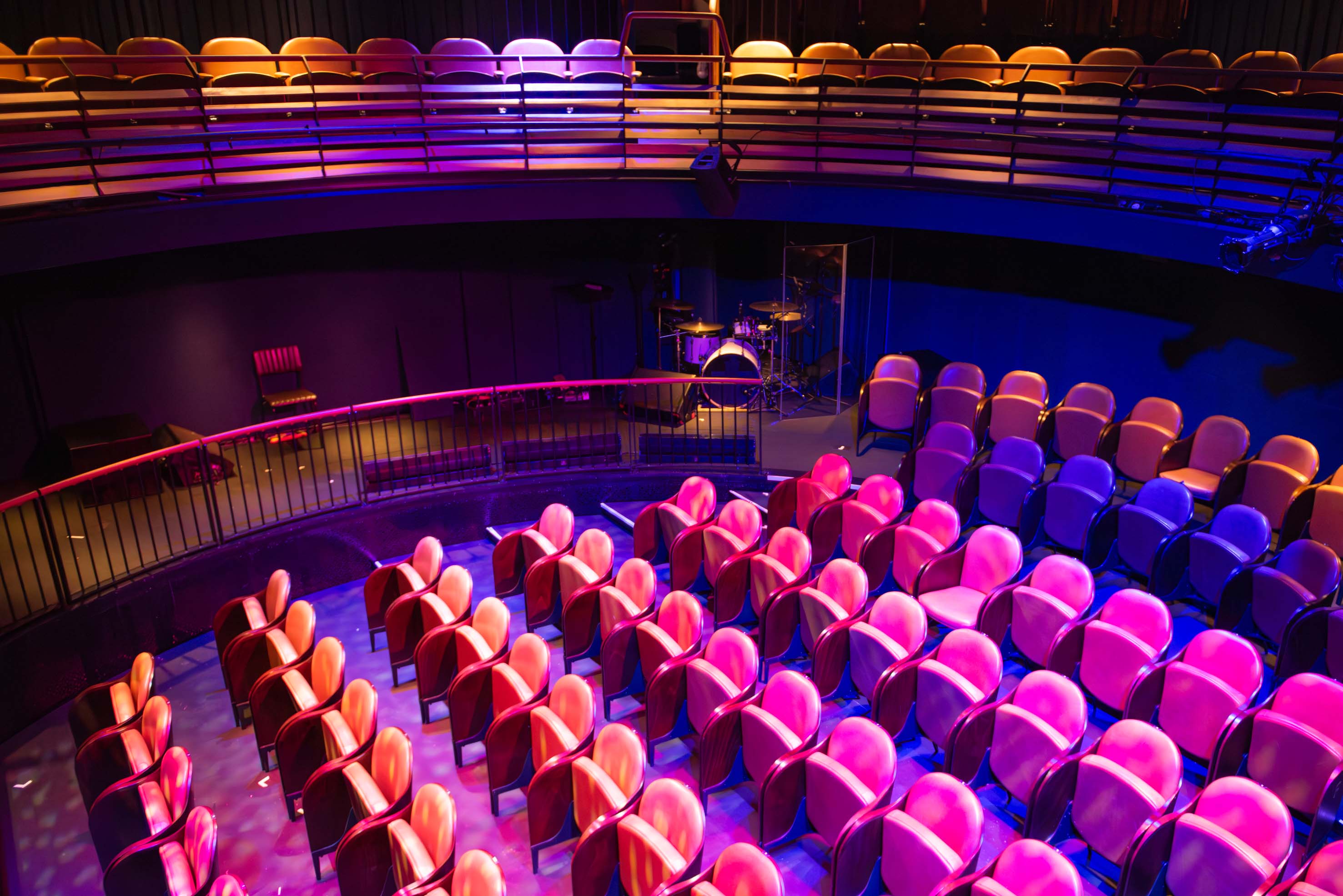 Auditorium in Underbelly Boulevard with tiered seating for intimate events and performances.