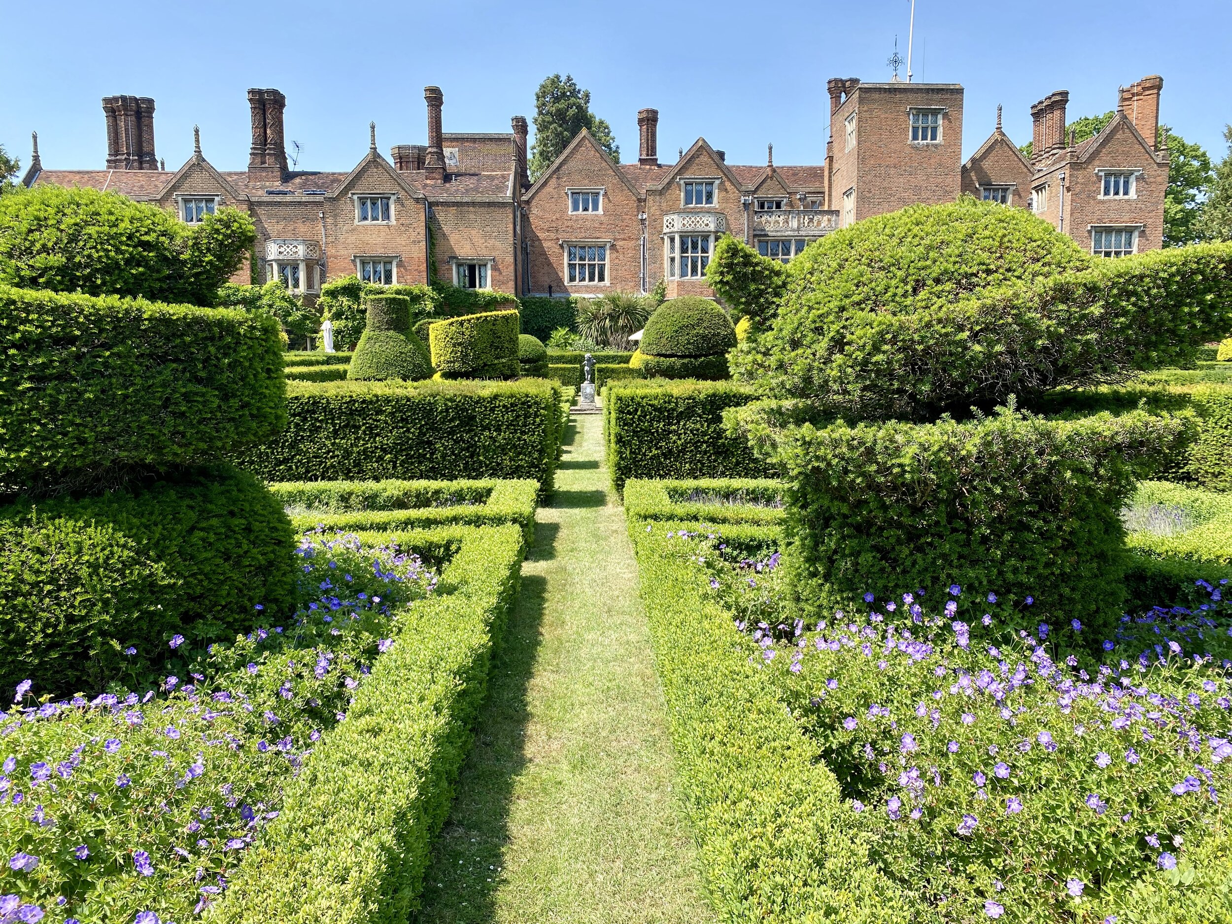 Magnolia Lawn at Great Fosters: manicured garden ideal for weddings and outdoor events.