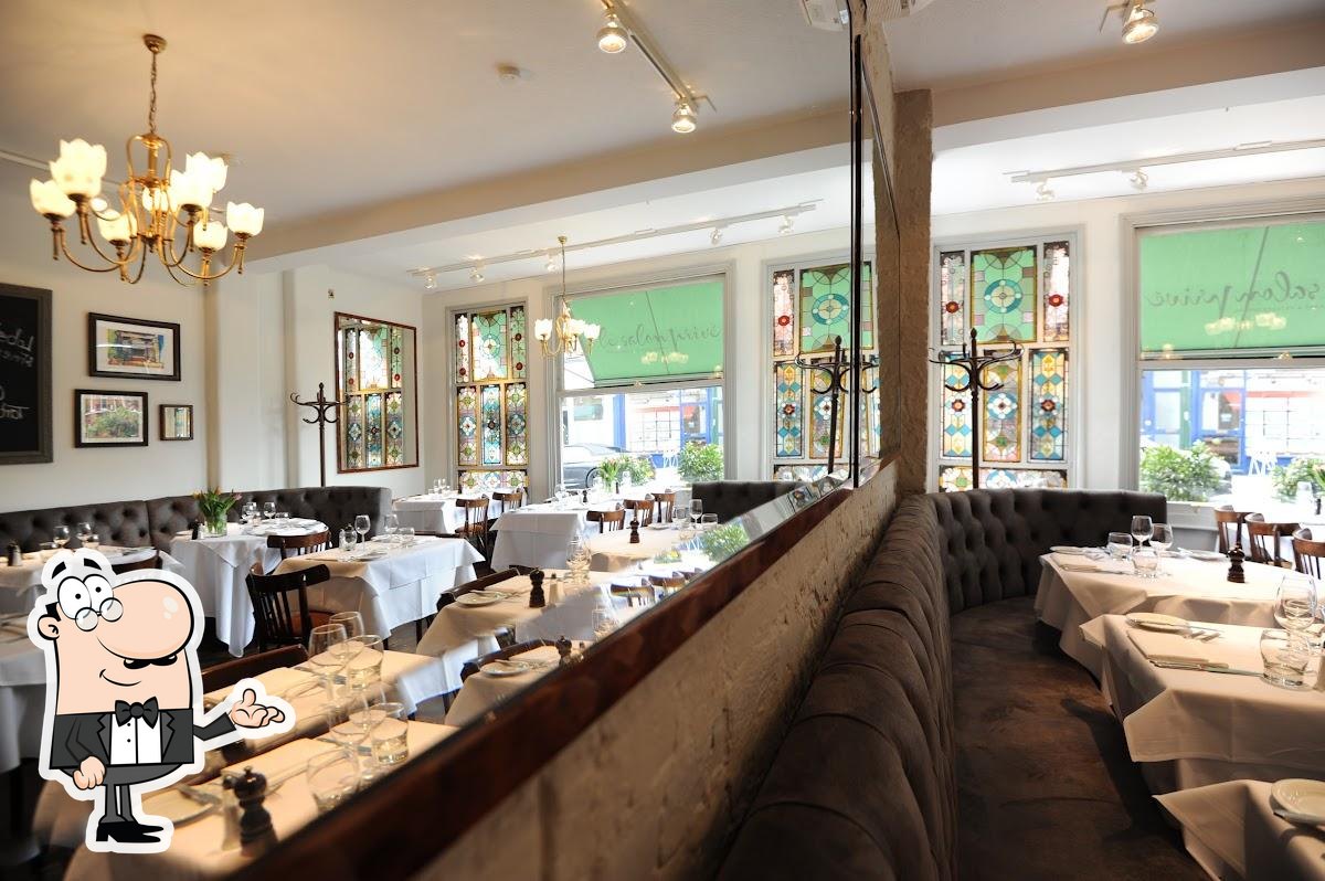 Elegant restaurant setting with plush seating for corporate lunches and private events.