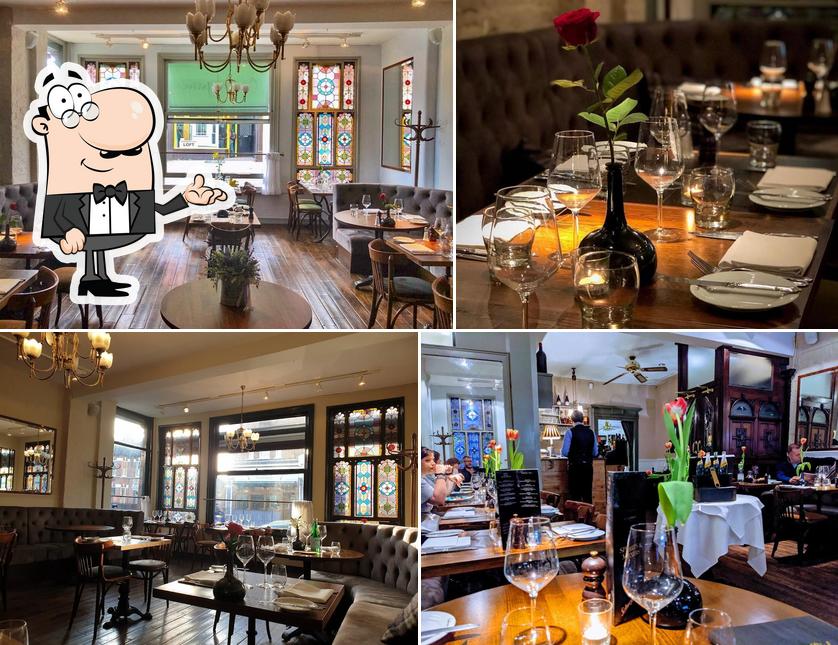 Elegant dining venue with stained glass, perfect for upscale events and corporate dinners.