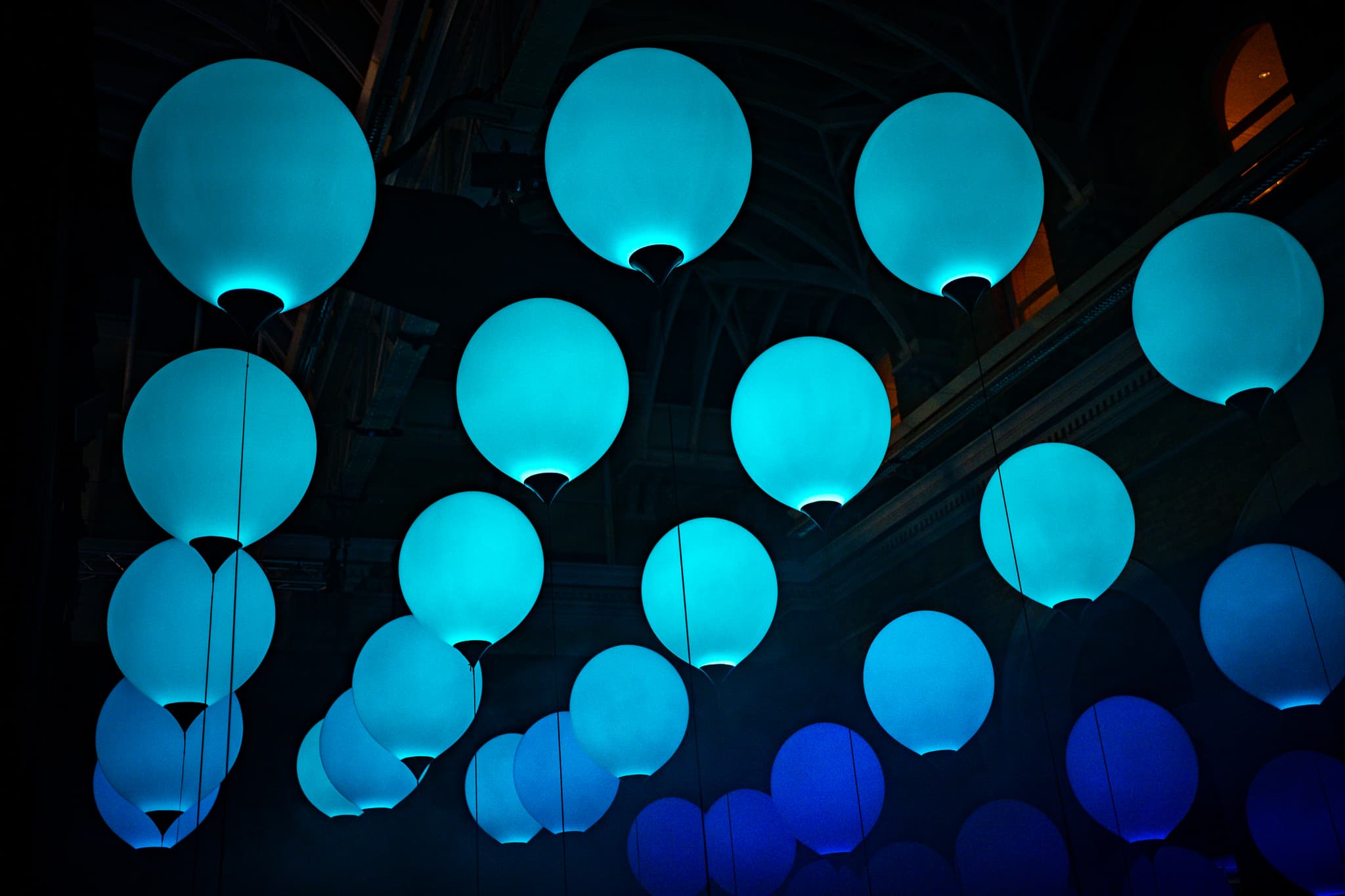 Illuminated hanging lanterns at Makepeace Studio for enchanting evening events.