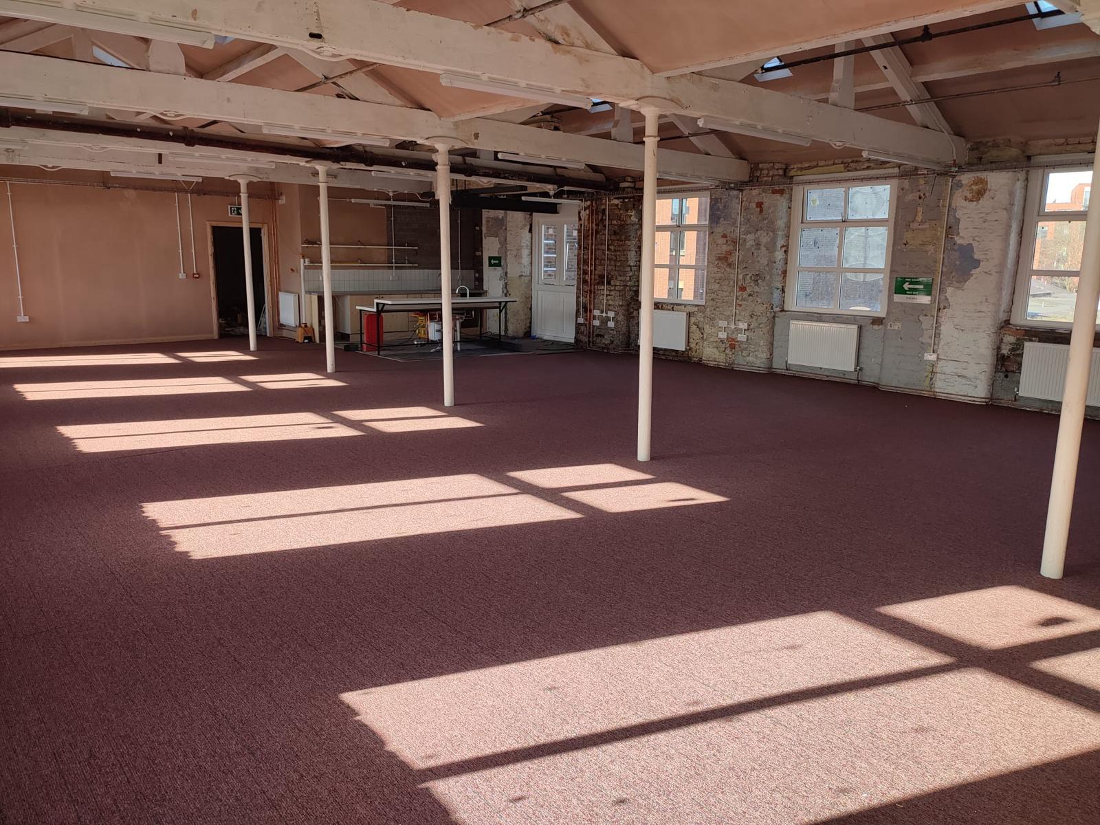 Spacious New Islington Mill venue with natural light for creative events and workshops.