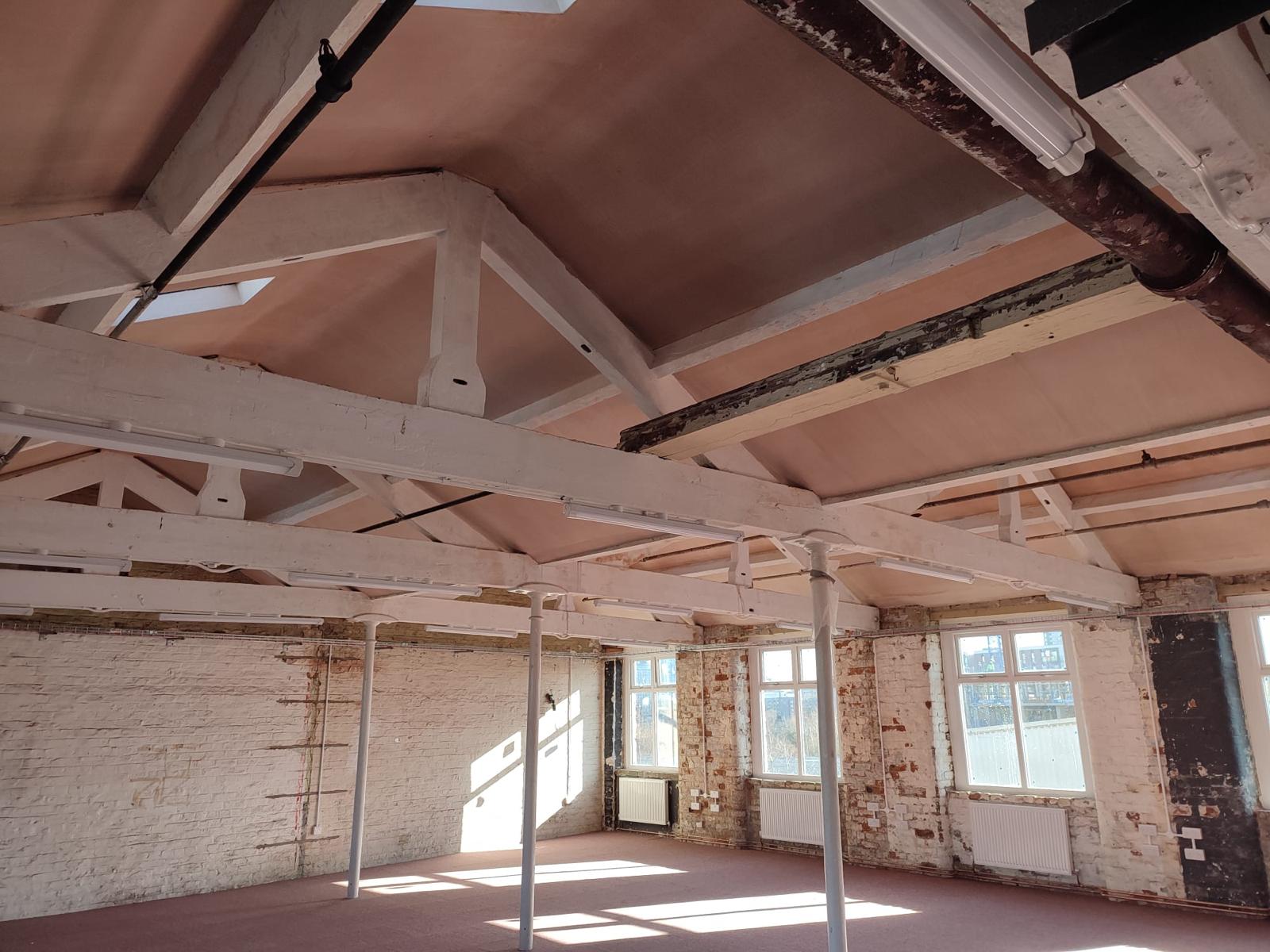 Spacious New Islington Mill venue with high ceilings for creative workshops and events.