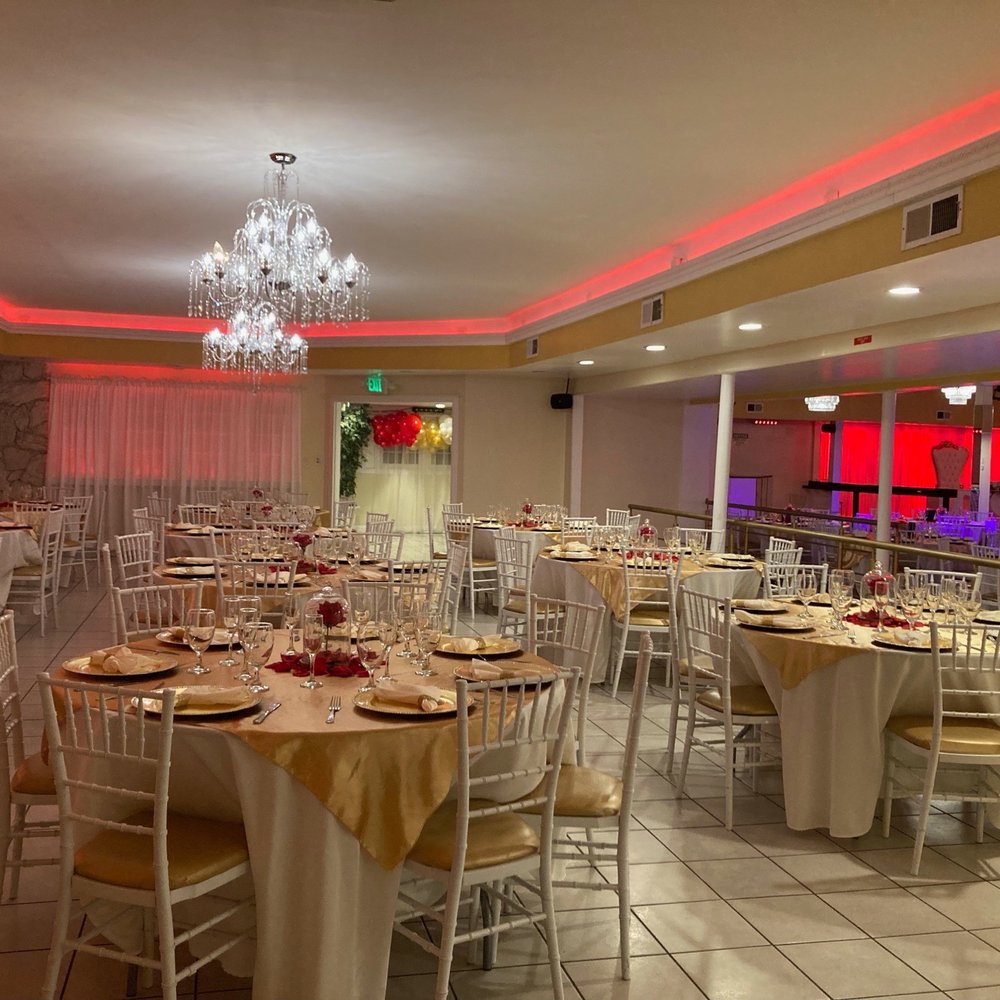 Elegant banquet hall with gold tablecloths, perfect for weddings and formal events.