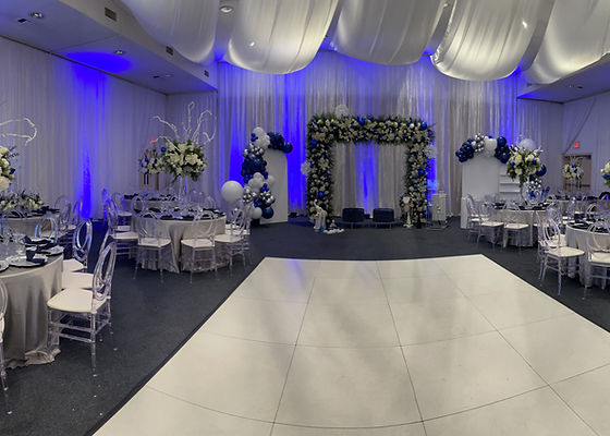 Elegant Saint Mina Banquet Hall with floral arch, perfect for weddings and upscale events.